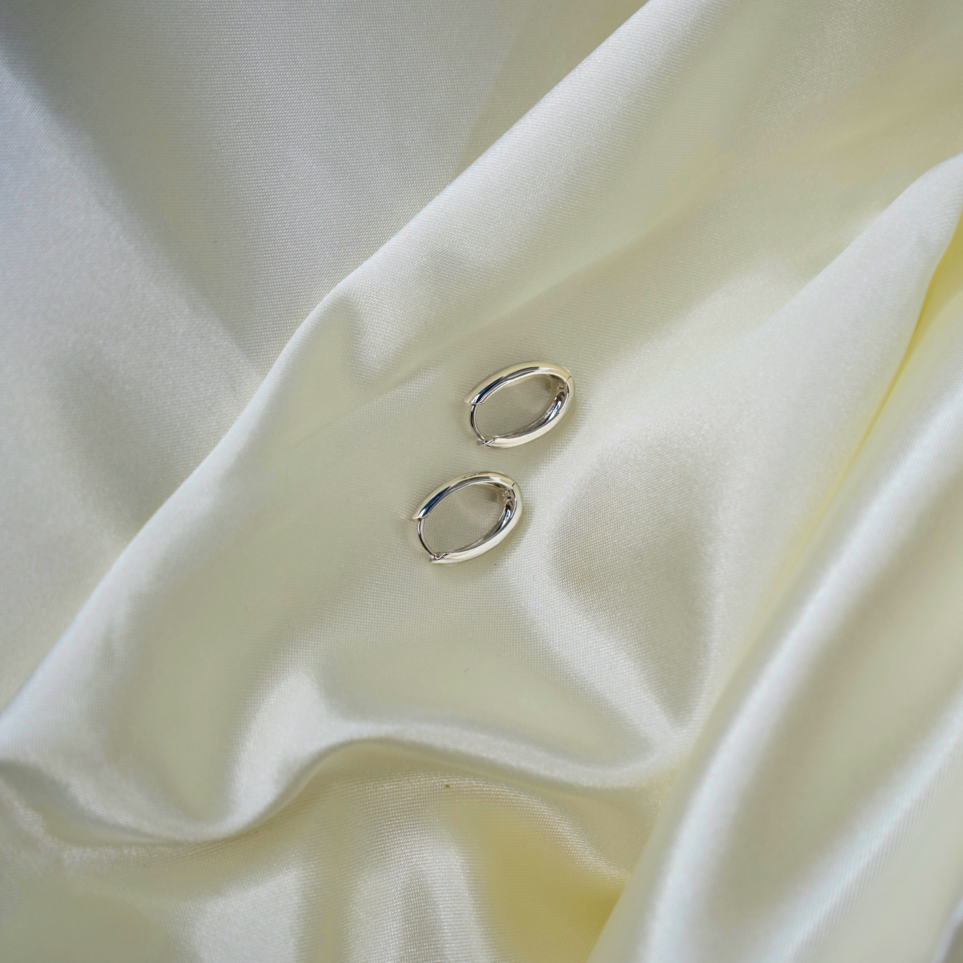 Skinny Oval Silver Hoops