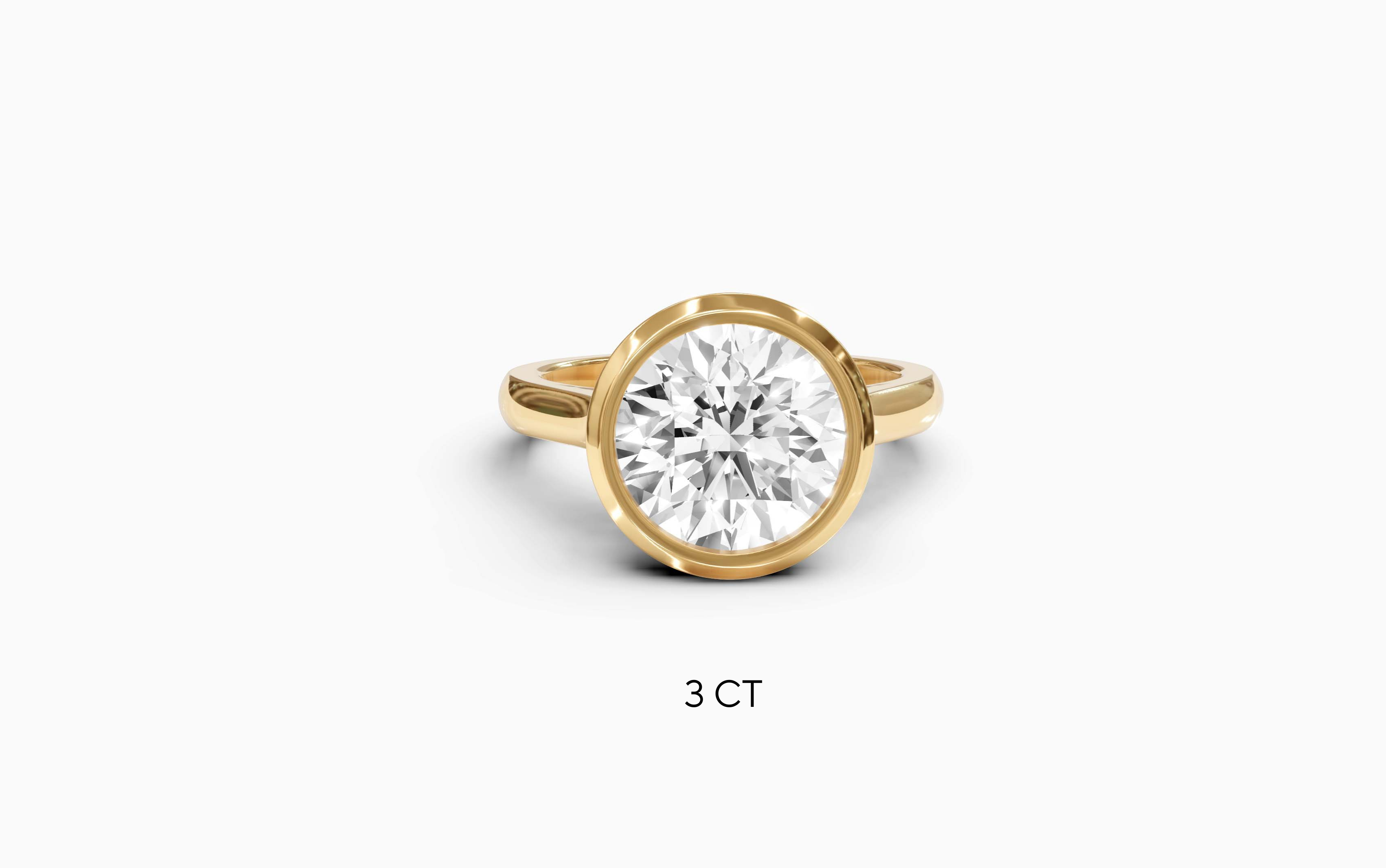 "Modern Perfection" Round Bezel Solitaire Ring in Yellow Gold
