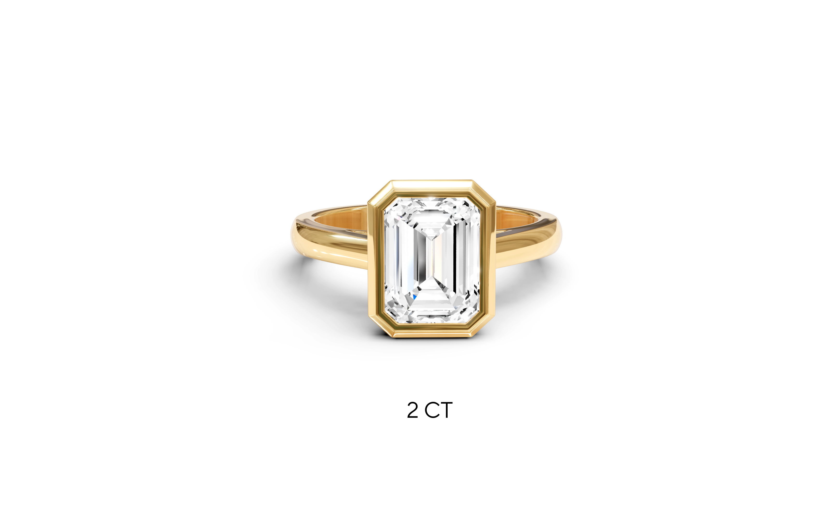 "It Girl" Bezel Emerald Cut Solitaire Ring in Yellow Gold