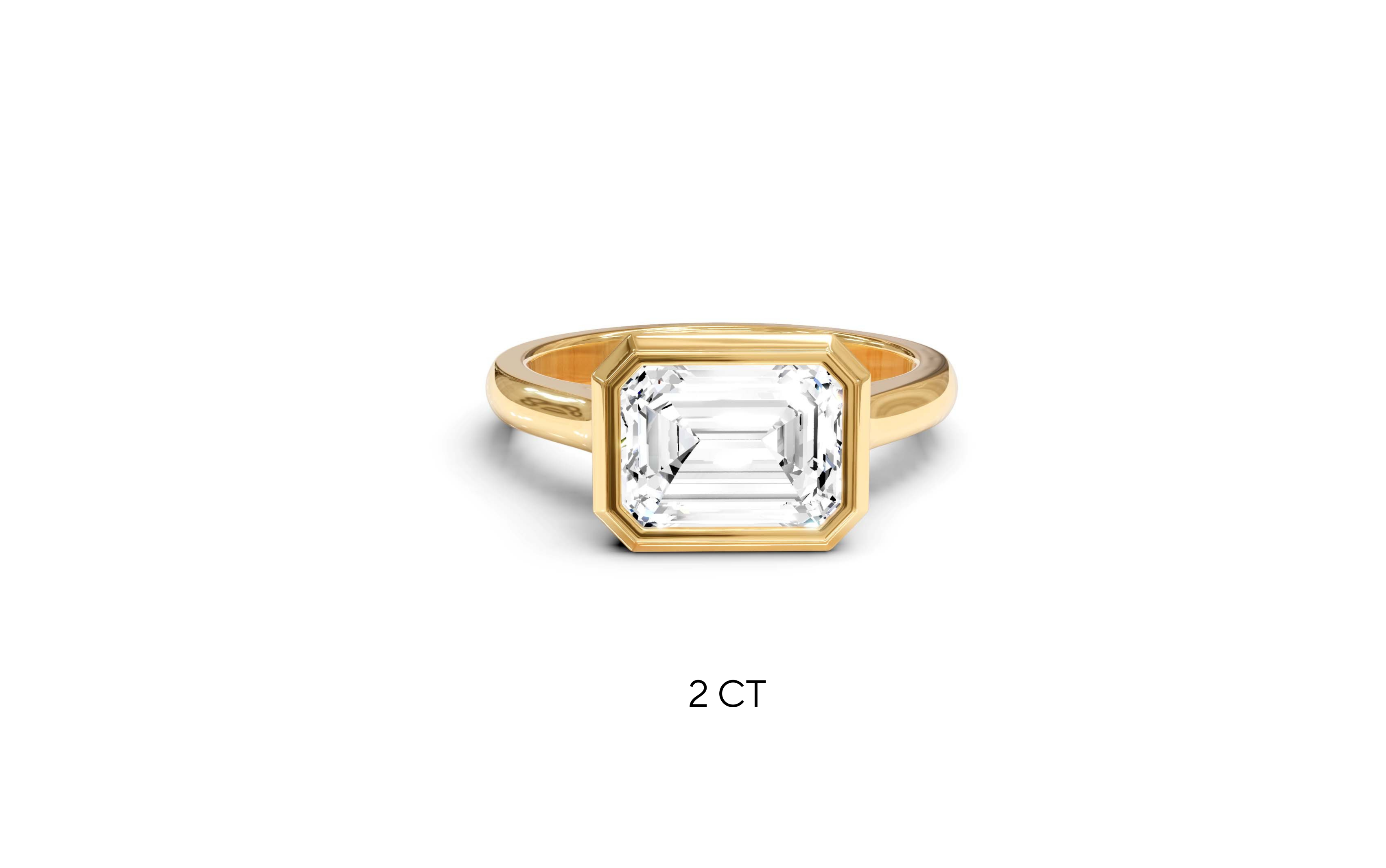 "It Girl" East-West Bezel Emerald Cut Solitaire Ring in Yellow Gold