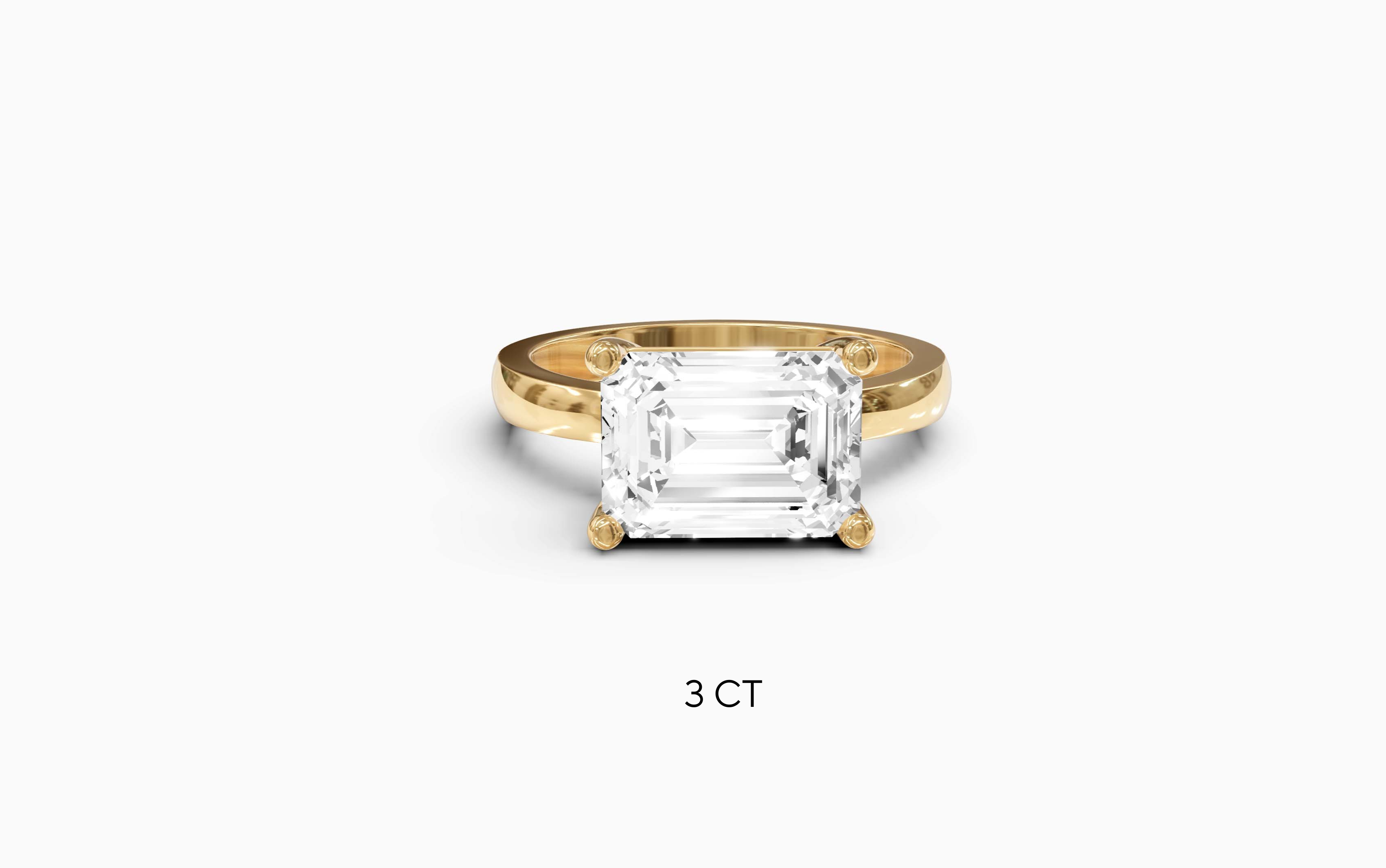 "The Sofia" East-West Version, Emerald Cut Solitaire Ring in Yellow Gold