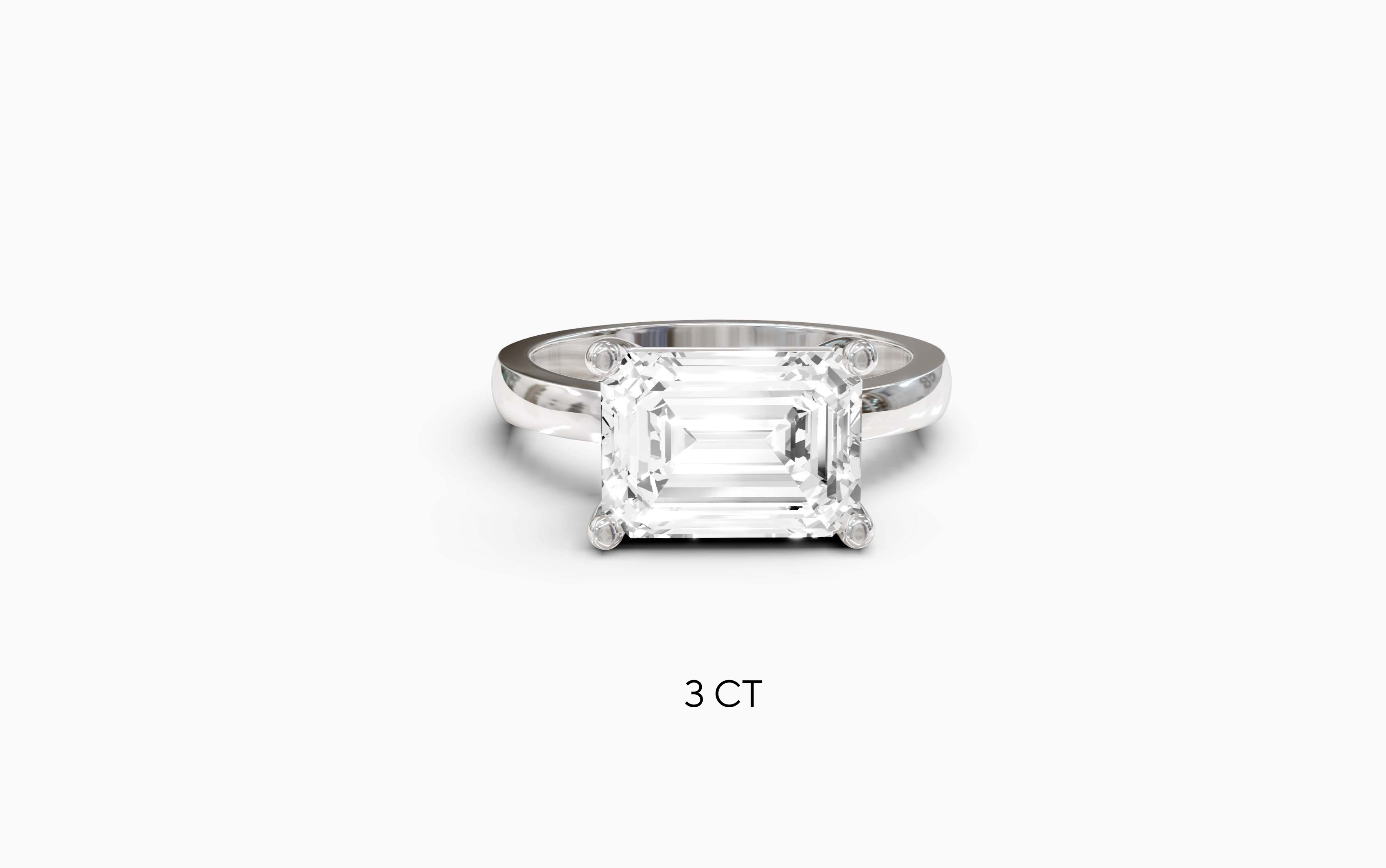 "The Sofia" East-West Version, Emerald Cut Solitaire Ring in White Gold