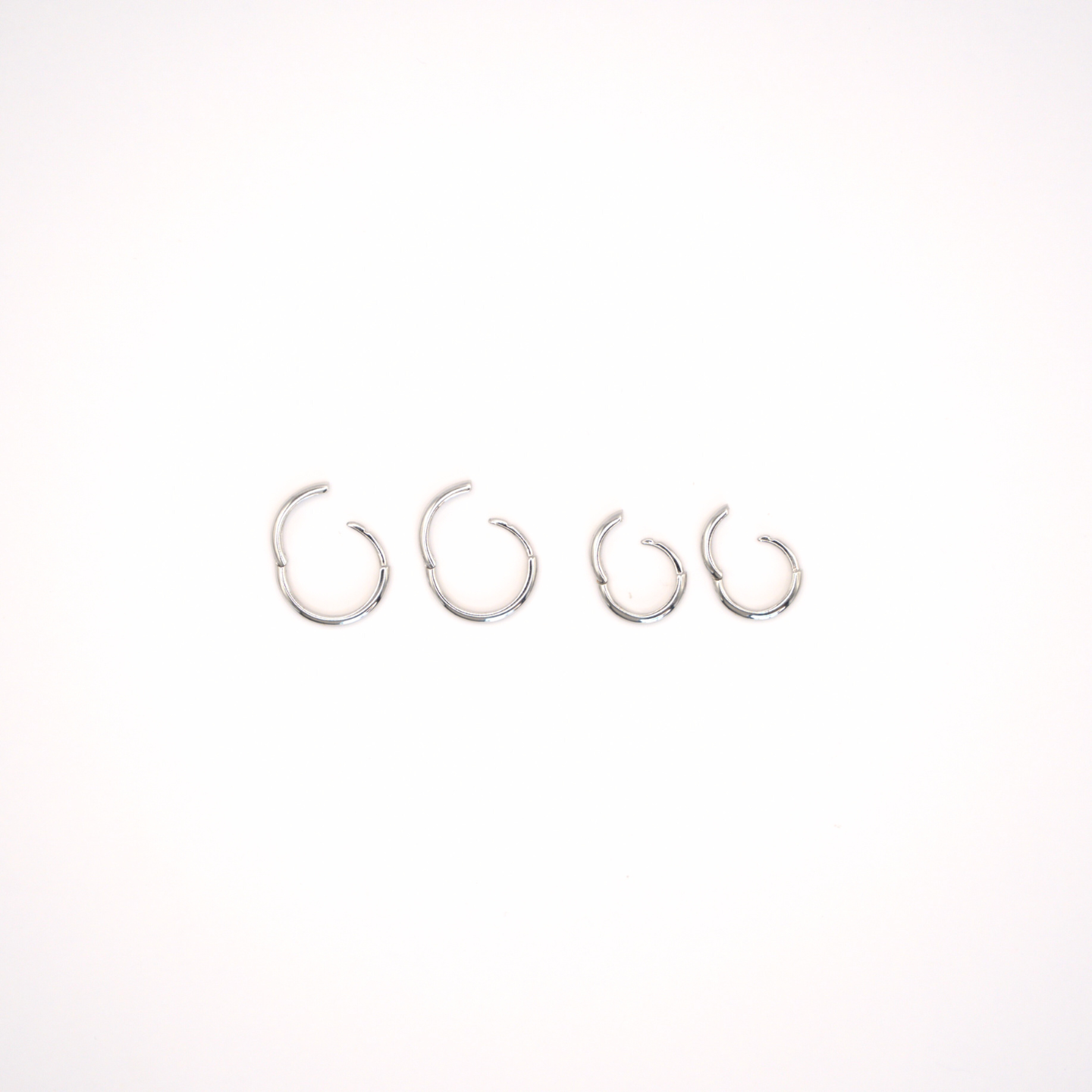 Tiny White Gold Huggies