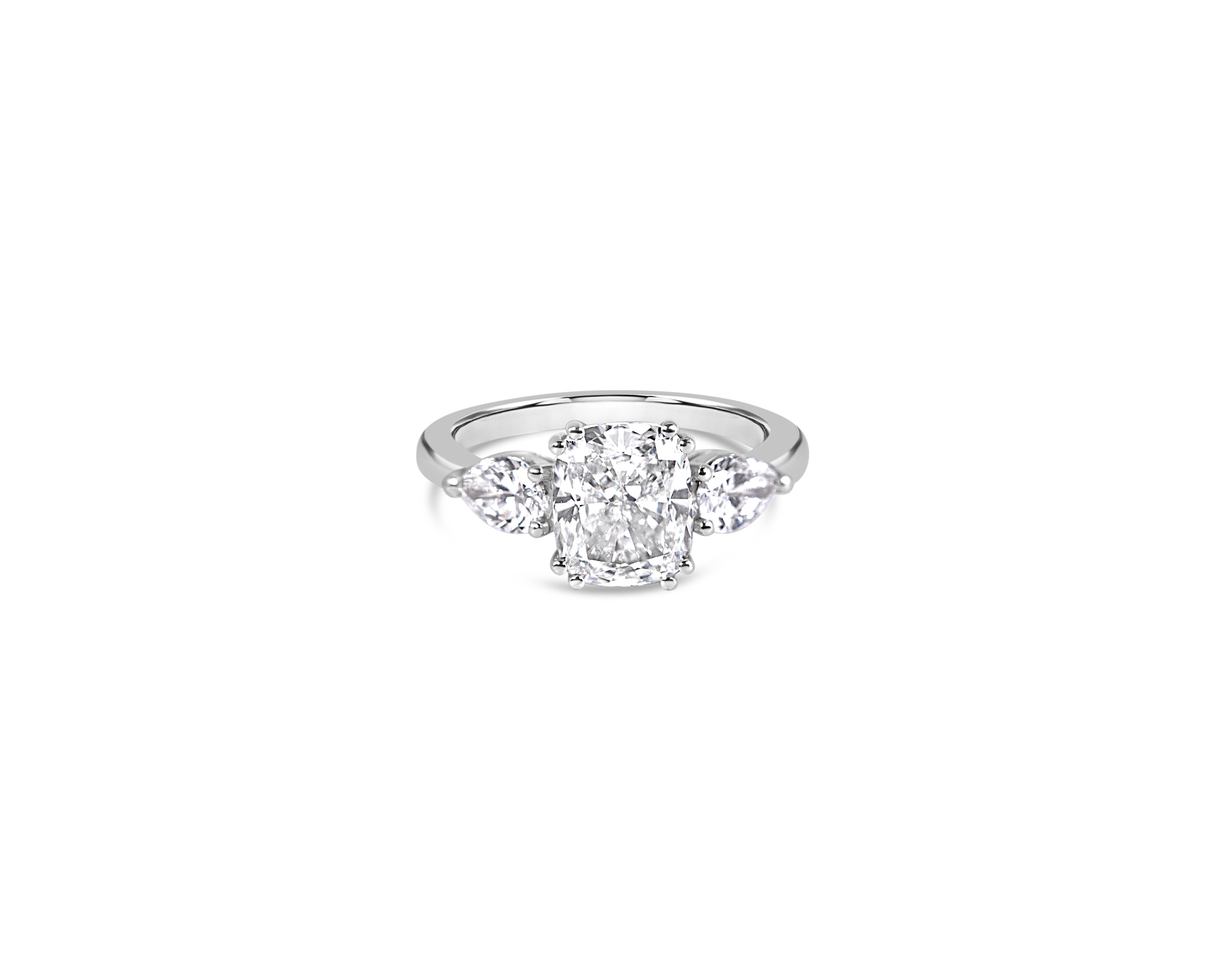 "Darling, V2" Elongated Cushion and Pear Three-Stone Ring