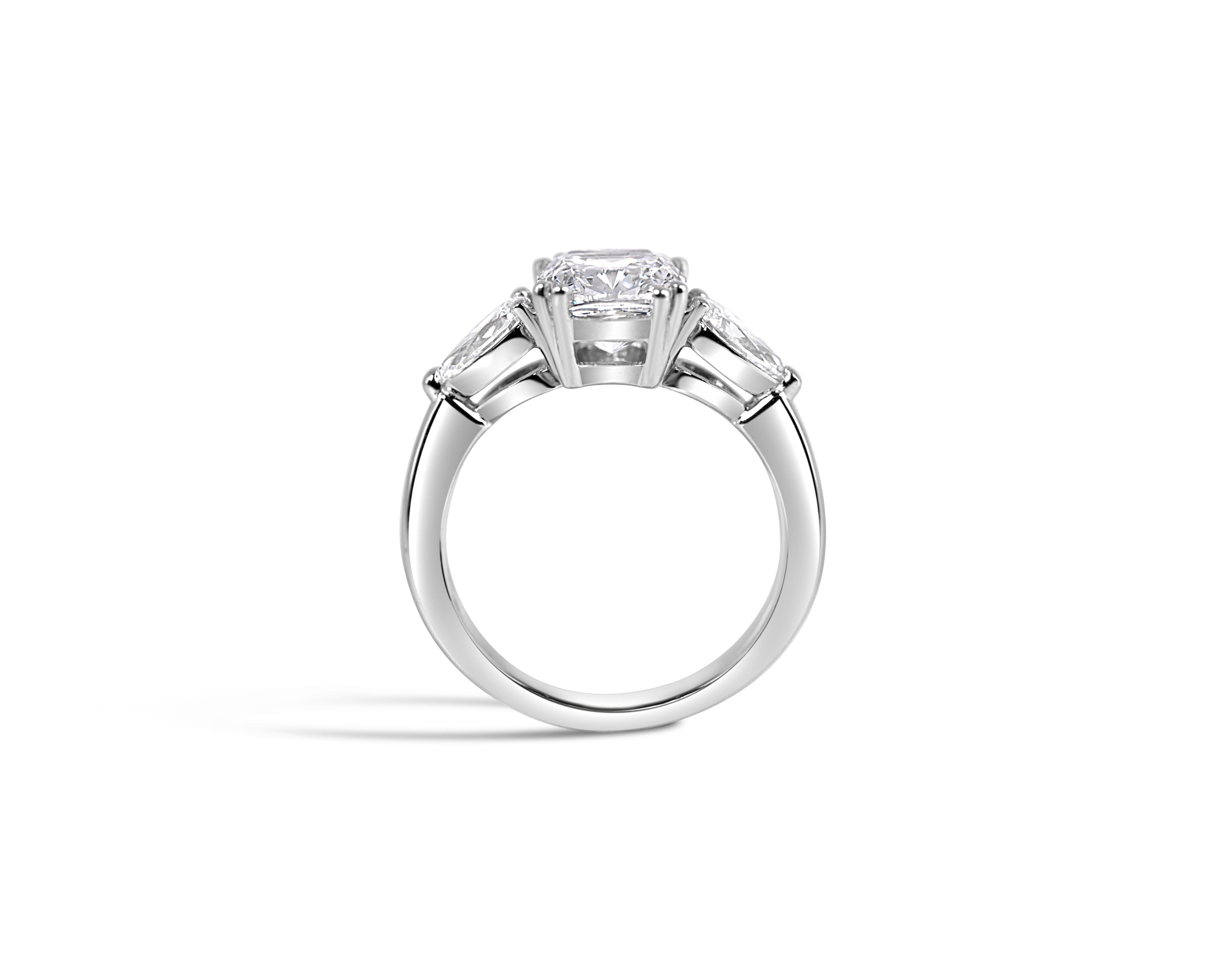 "Darling, V2" Elongated Cushion and Pear Three-Stone Ring