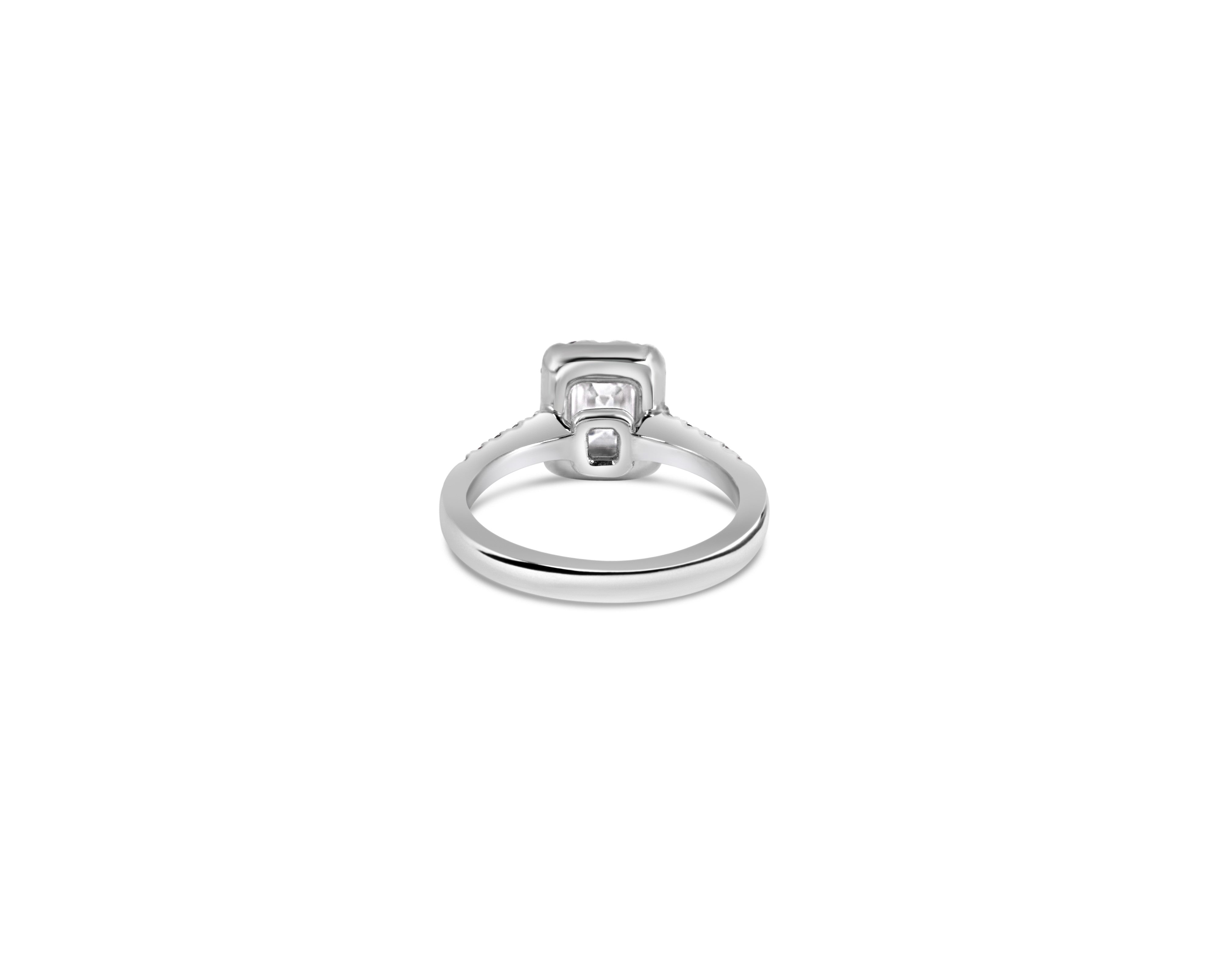 "Elegance" Emerald Cut Halo Ring with Pavé Band