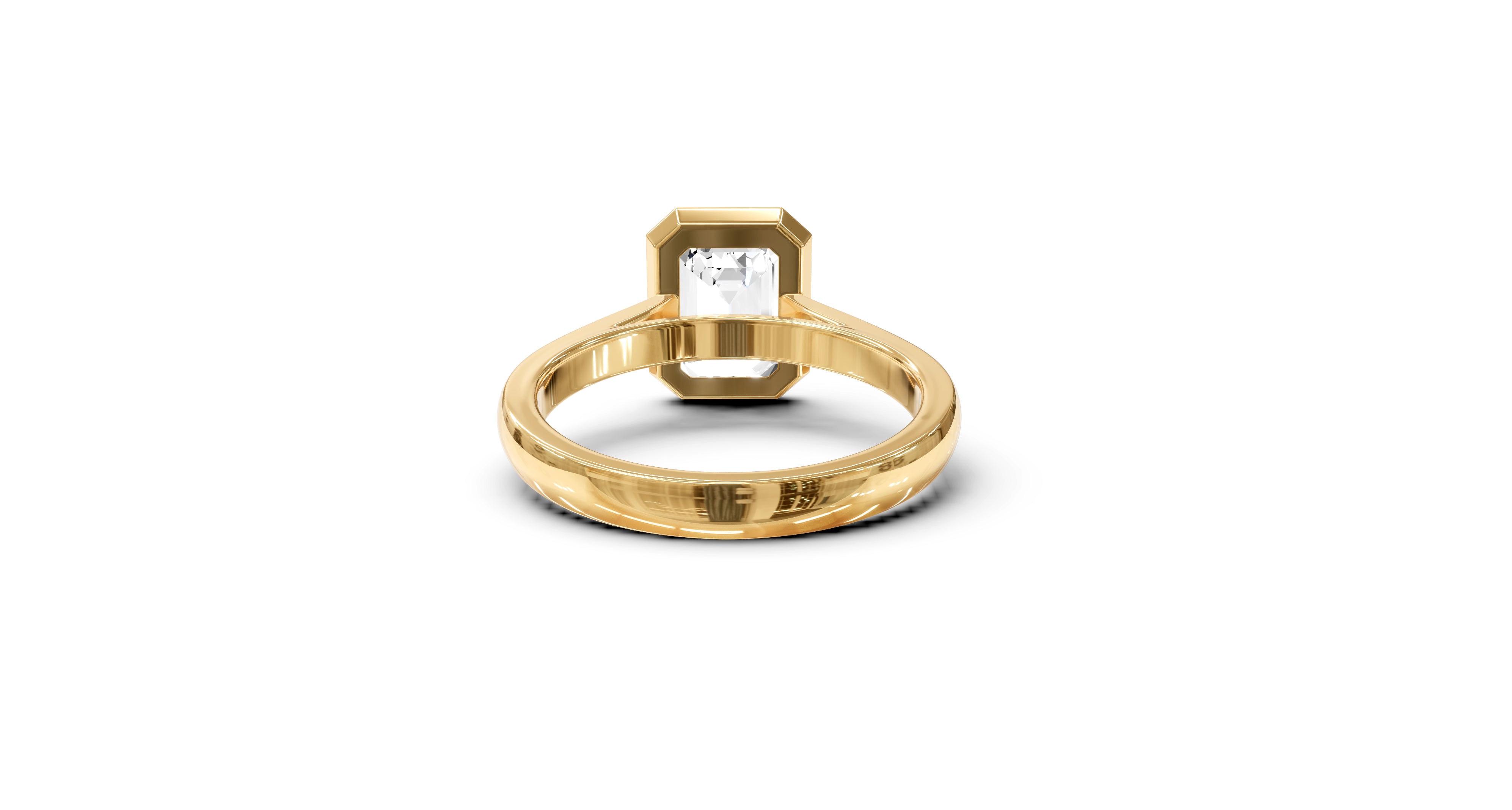 "It Girl" Bezel Emerald Cut Solitaire Ring in Yellow Gold