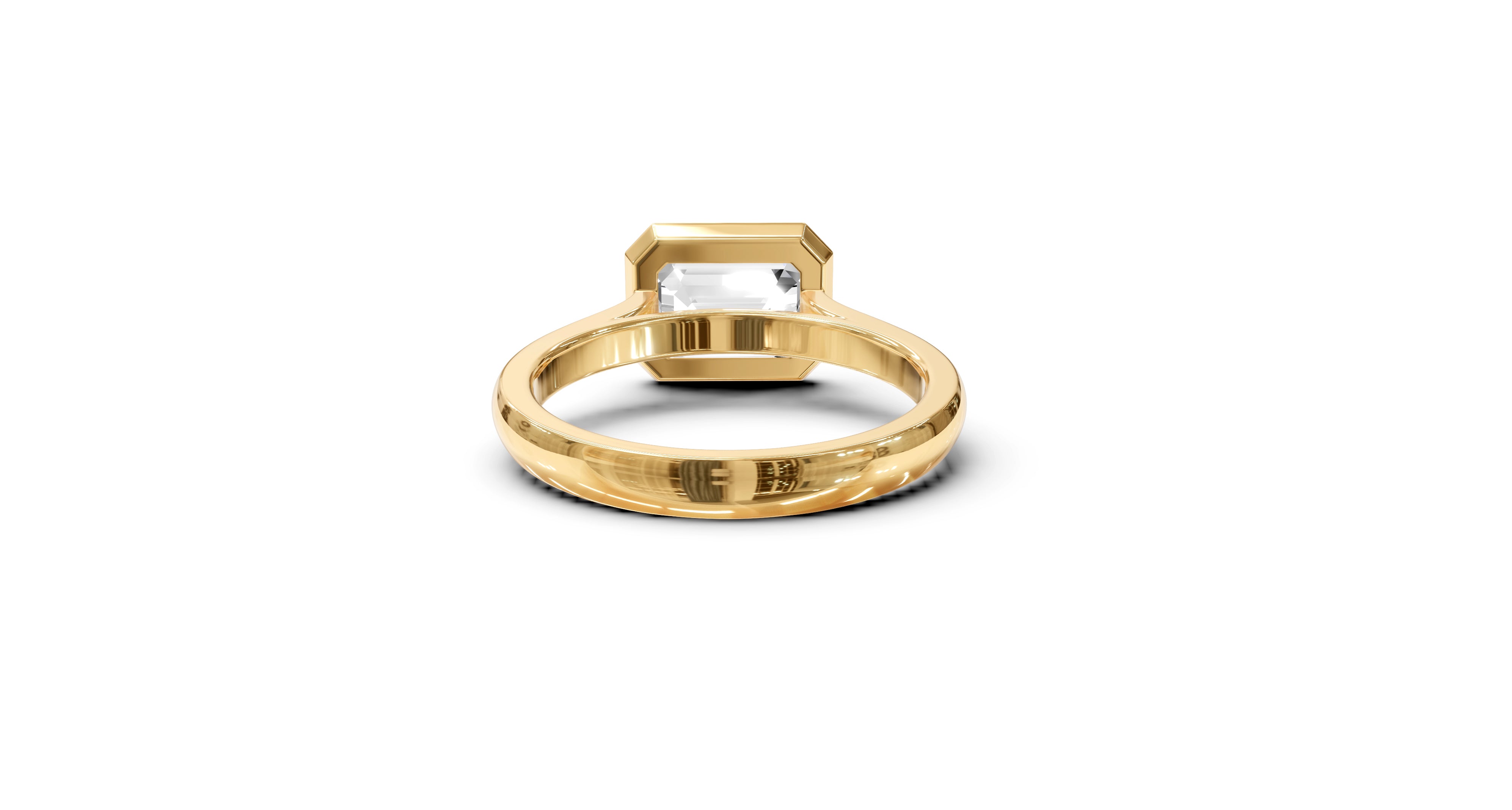 "It Girl" East-West Bezel Emerald Cut Solitaire Ring in Yellow Gold