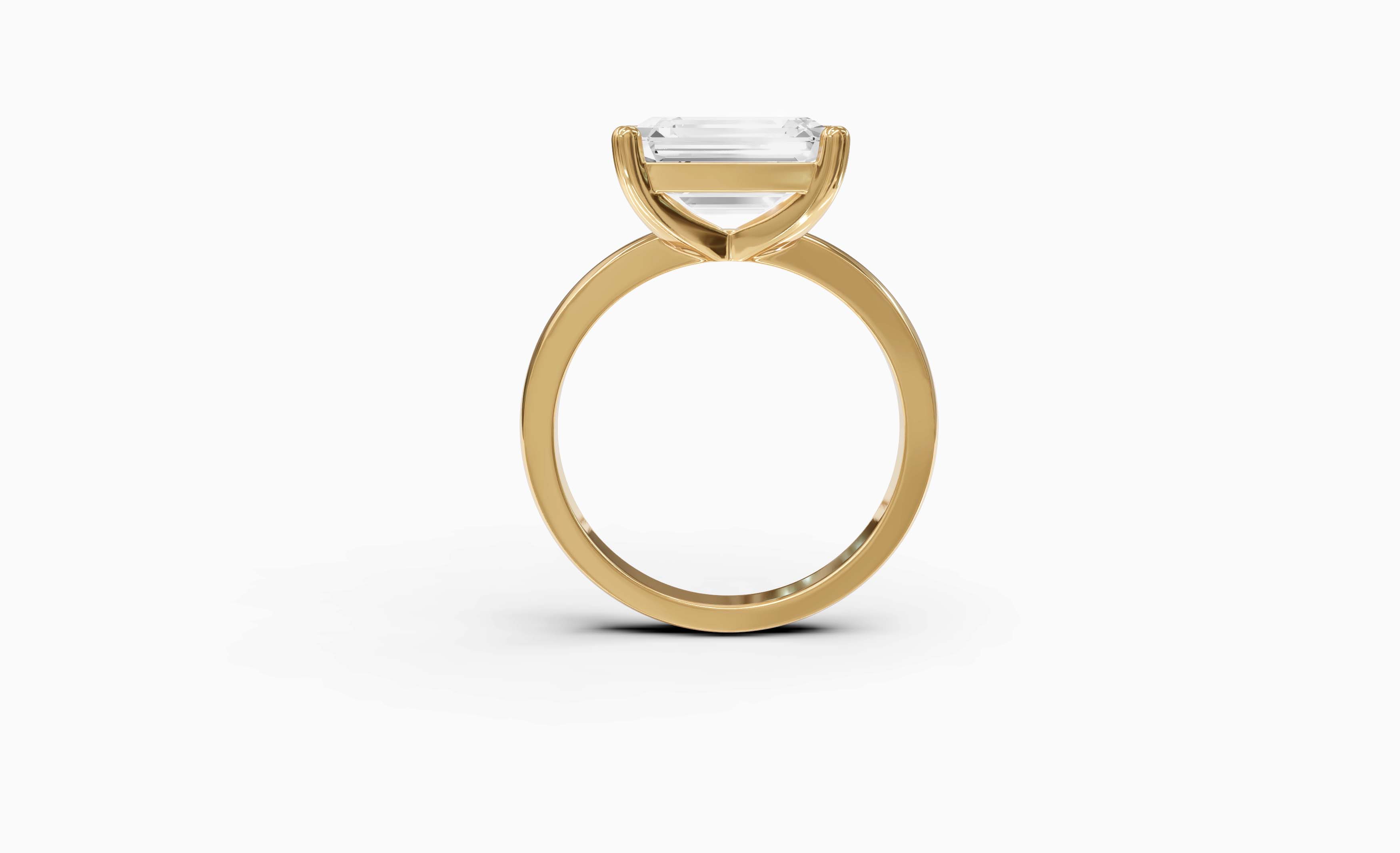"The Sofia" East-West Version, Emerald Cut Solitaire Ring in Yellow Gold