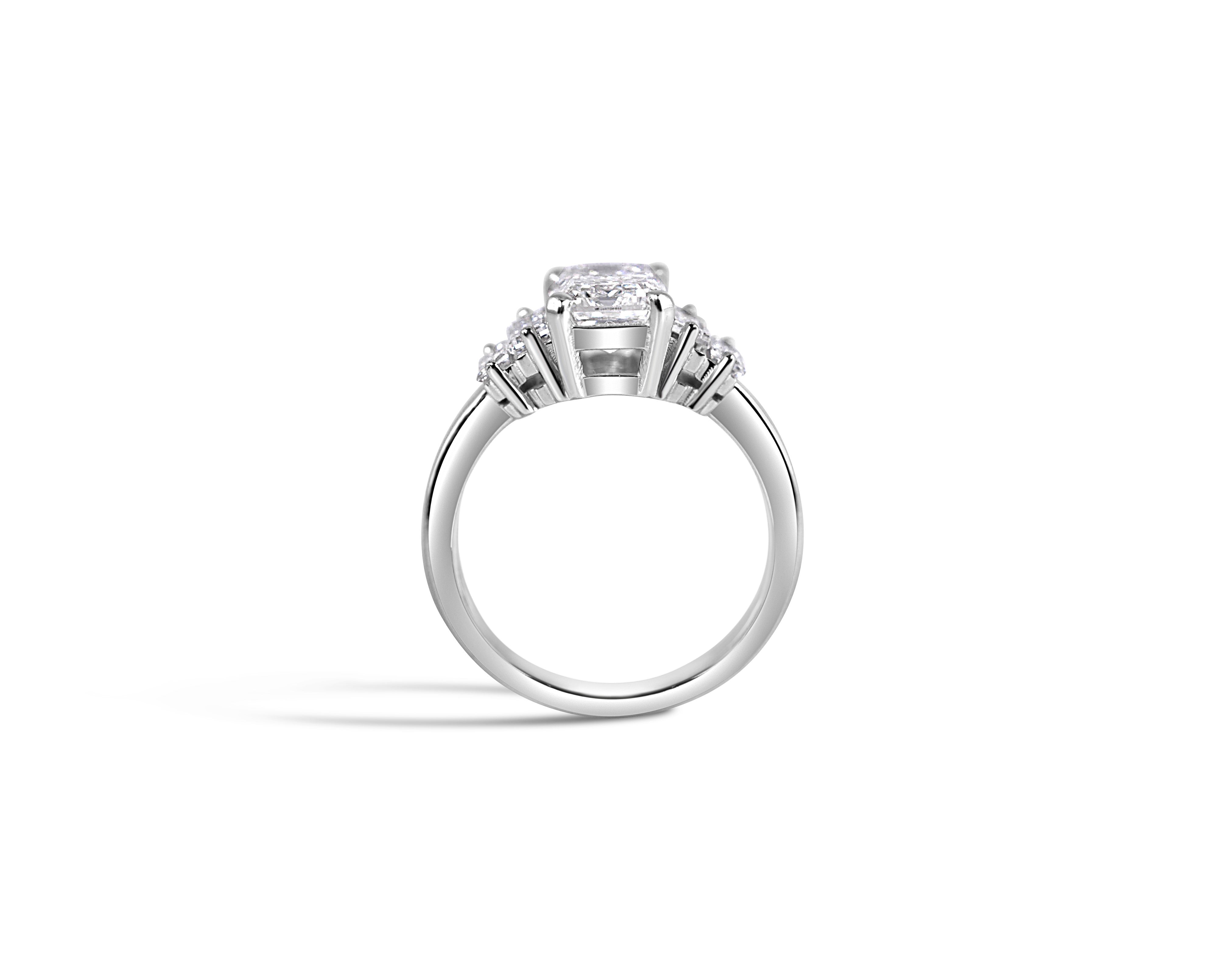 "Hall of Mirrors, V2" Five-Stone Ring with Central Emerald Cut and Four Side Baguettes