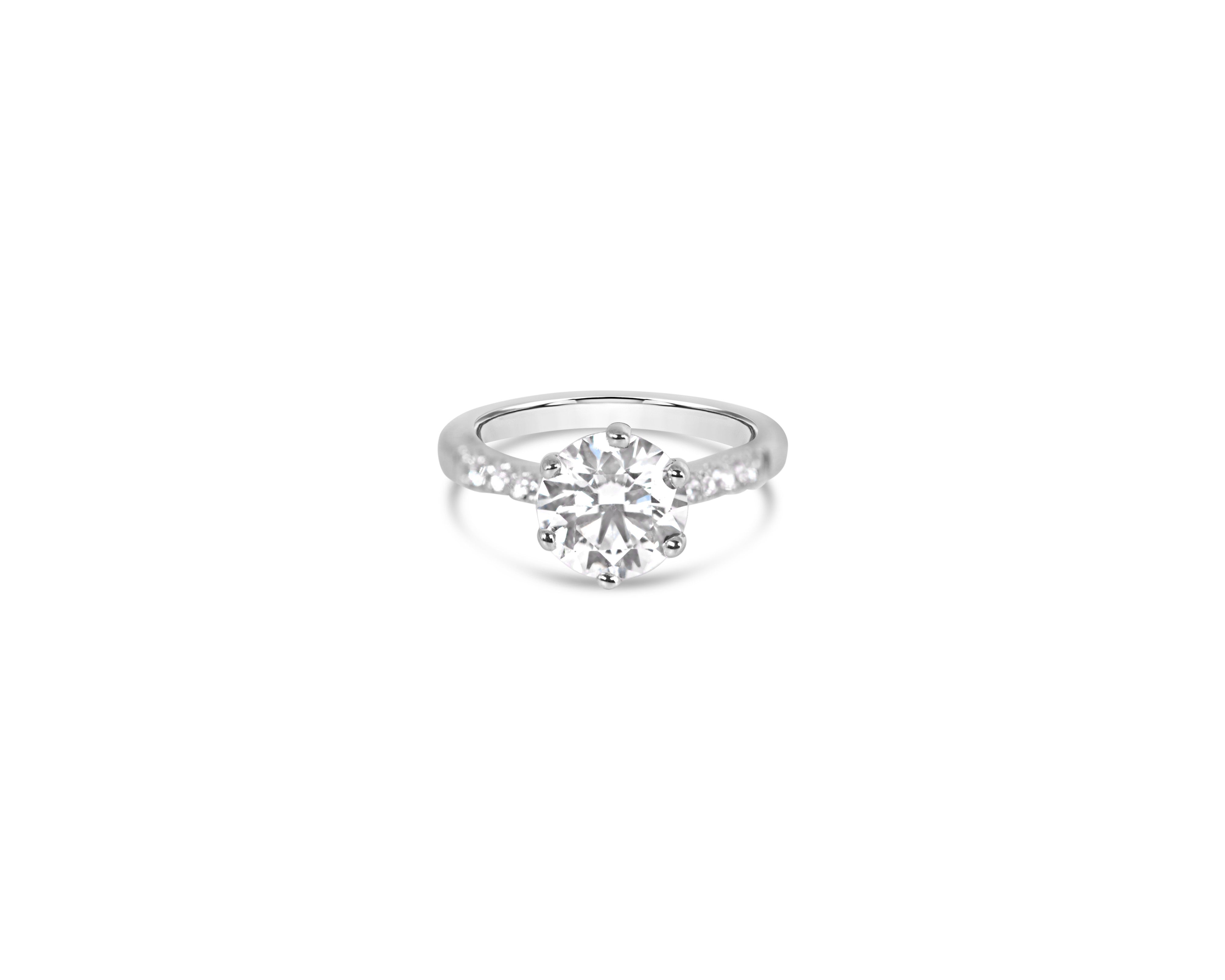 "Fit for a Queen, L" Round Solitaire Ring on Crown Basket with Pavé Band