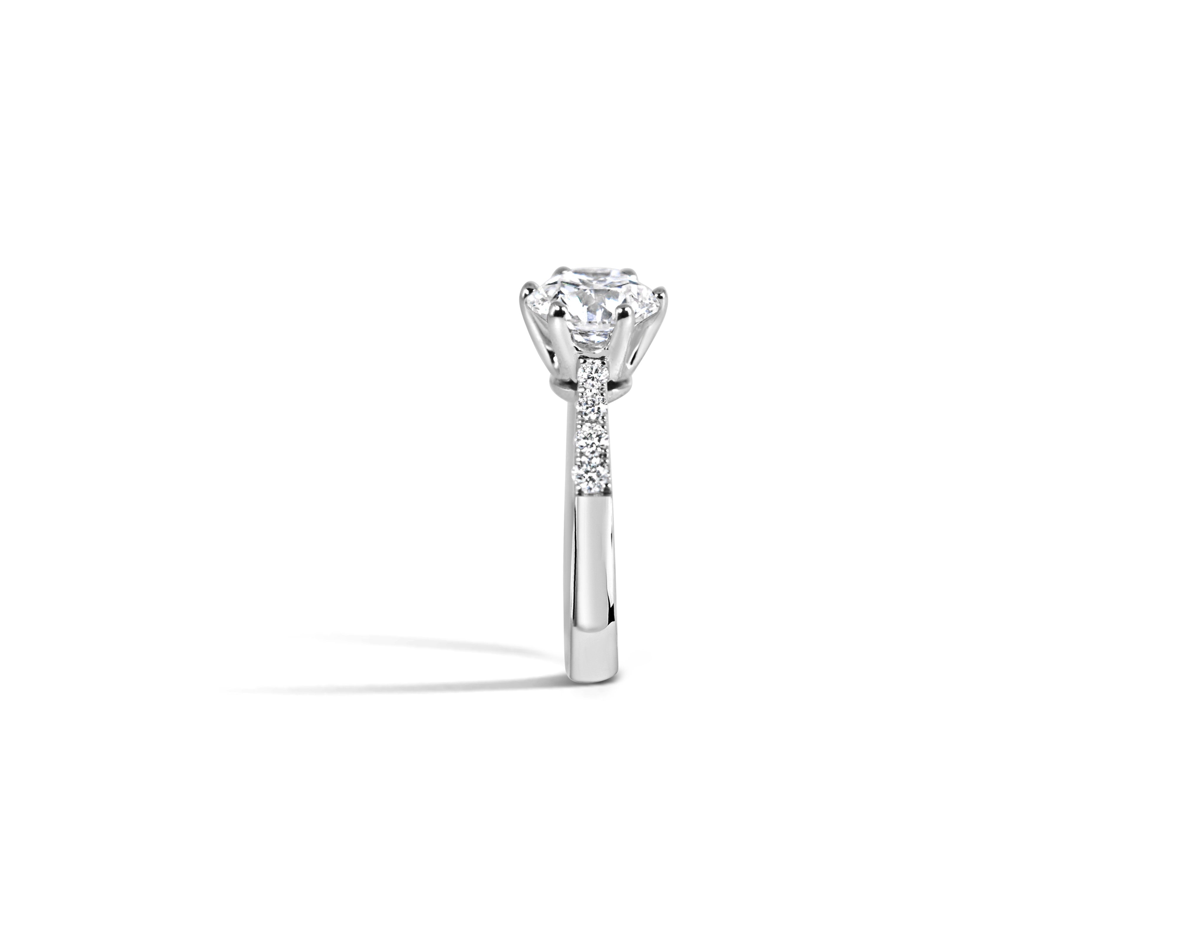 "Fit for a Queen, L" Round Solitaire Ring on Crown Basket with Pavé Band