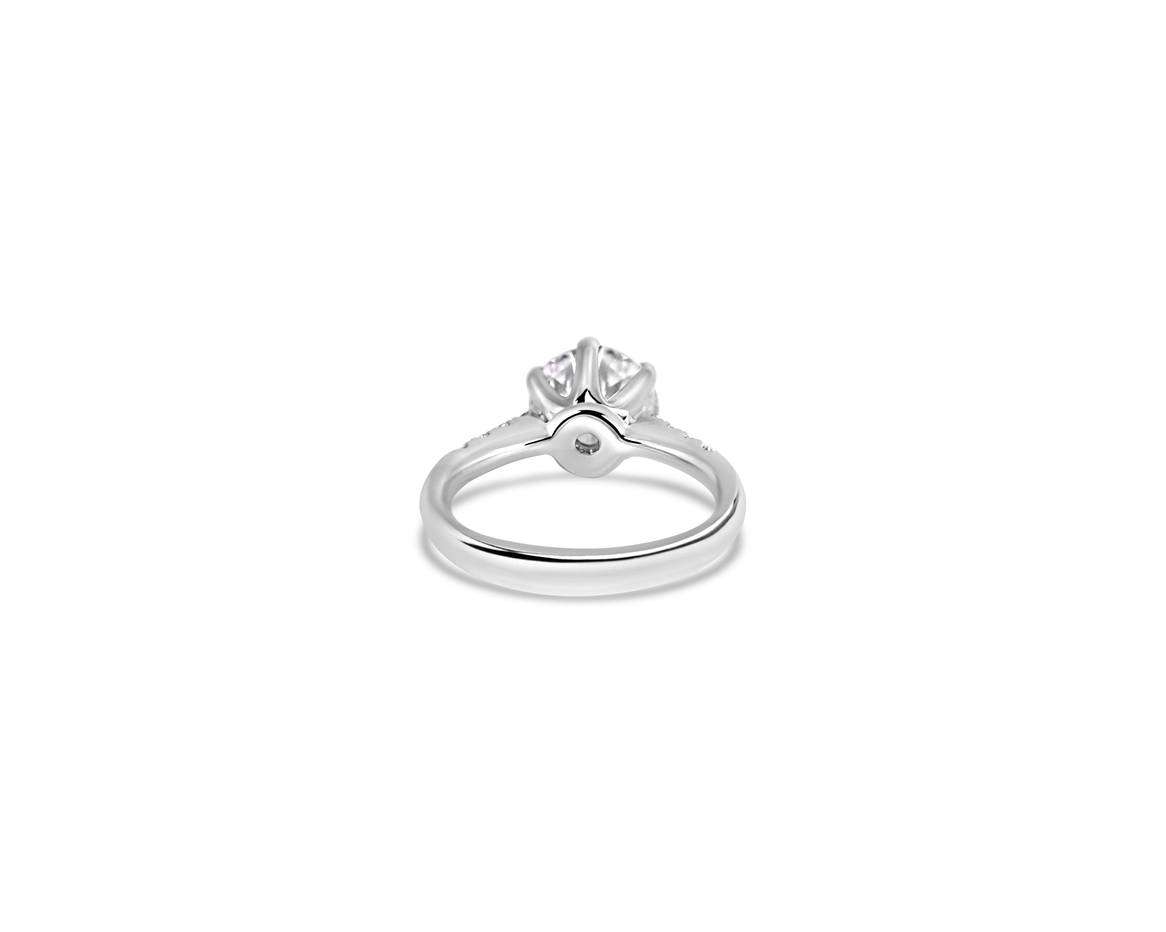 "Fit for a Queen, L" Round Solitaire Ring on Crown Basket with Pavé Band