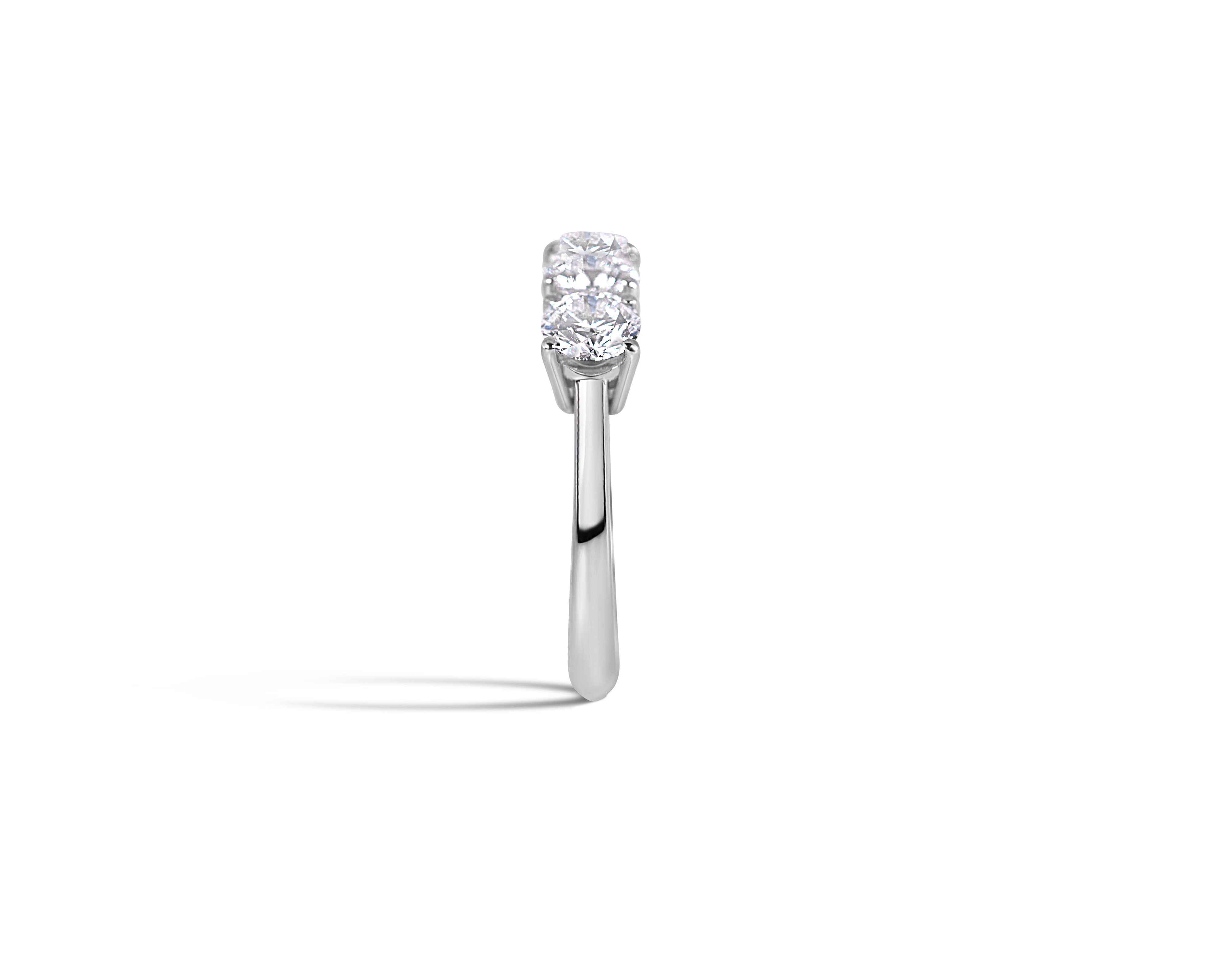 "Past, Present and Future, M"
Round Three-Stone Ring