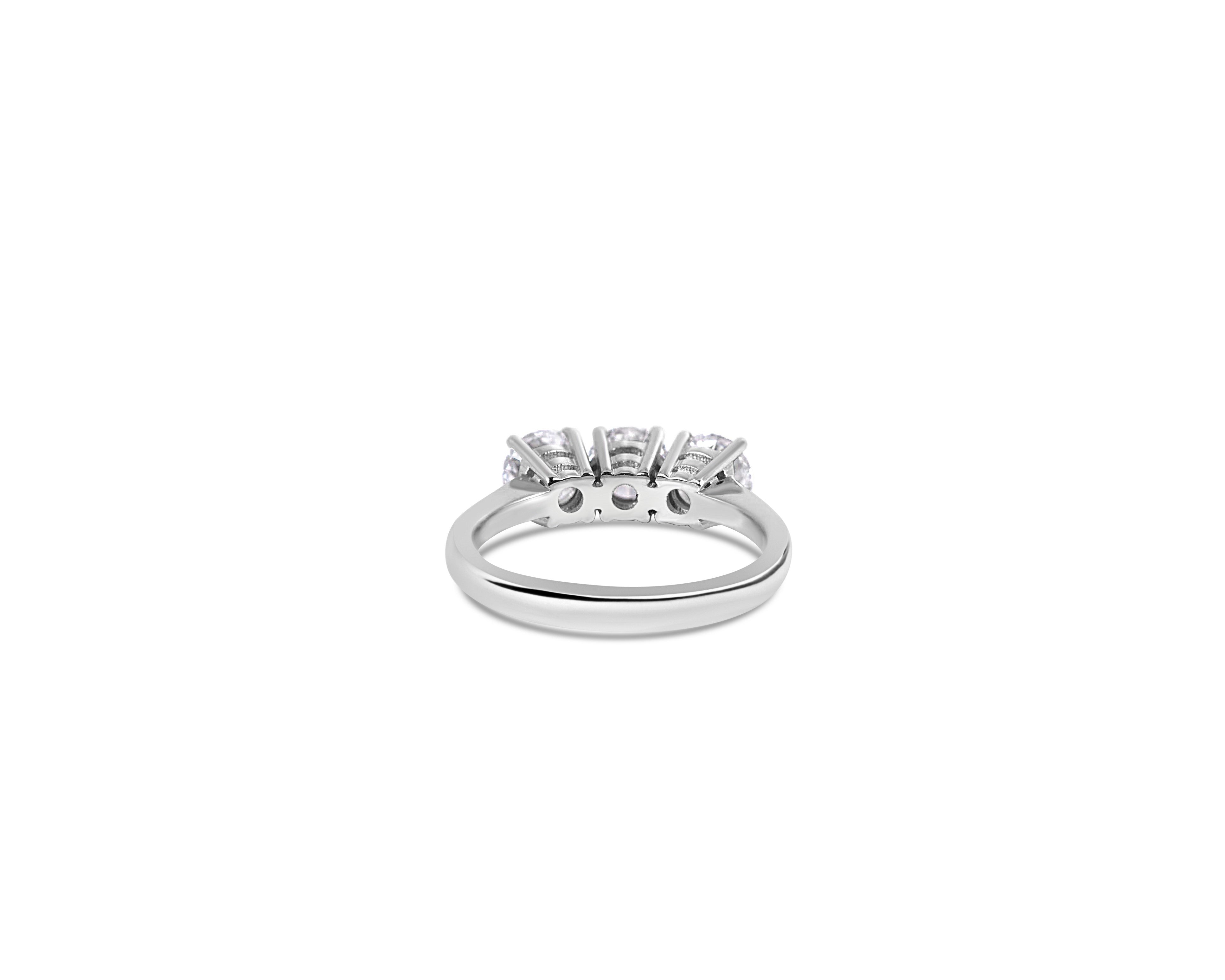 "Past, Present and Future, M"
Round Three-Stone Ring