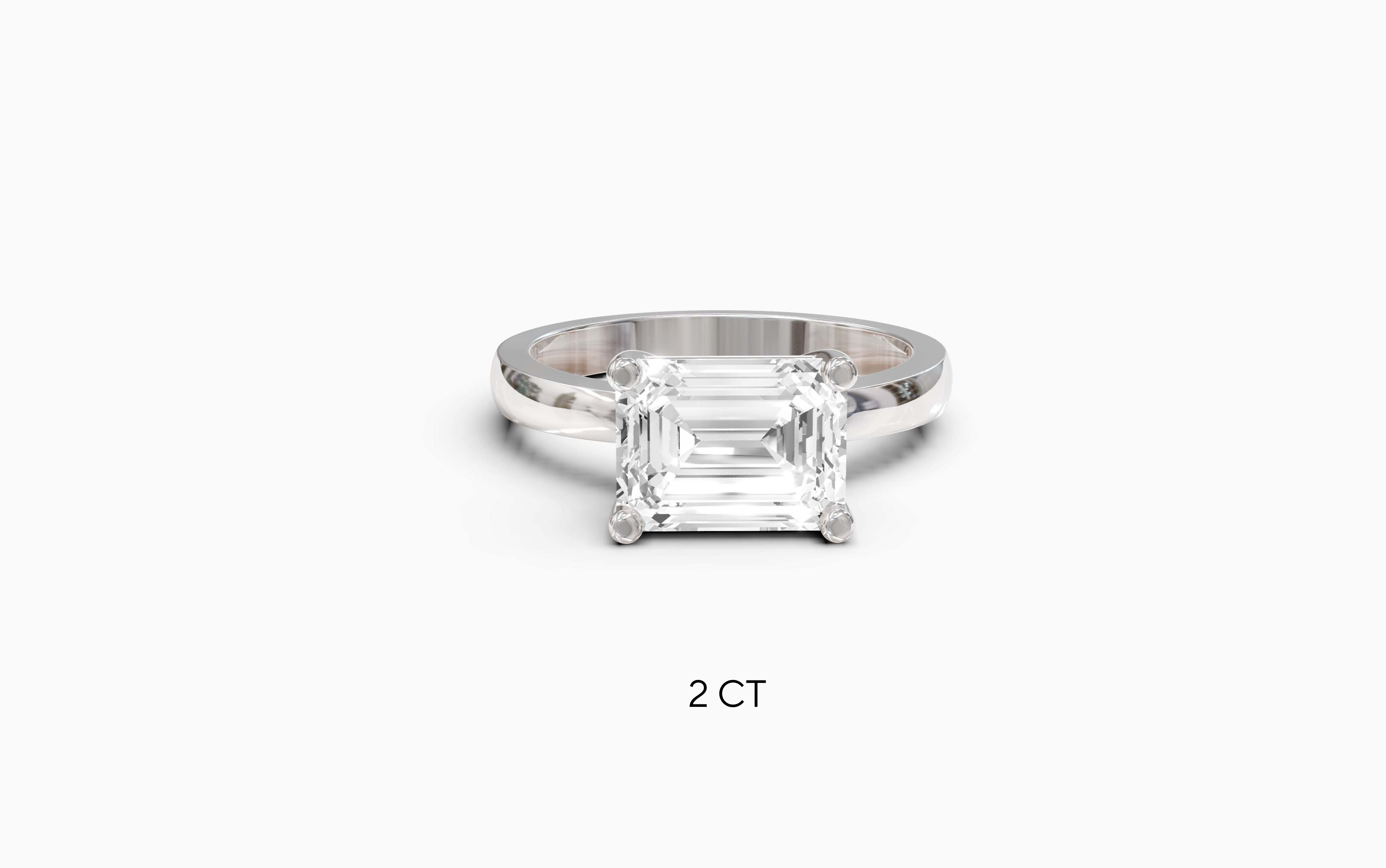 "The Sofia" East-West Version,  Emerald Cut Solitaire Ring in White Gold