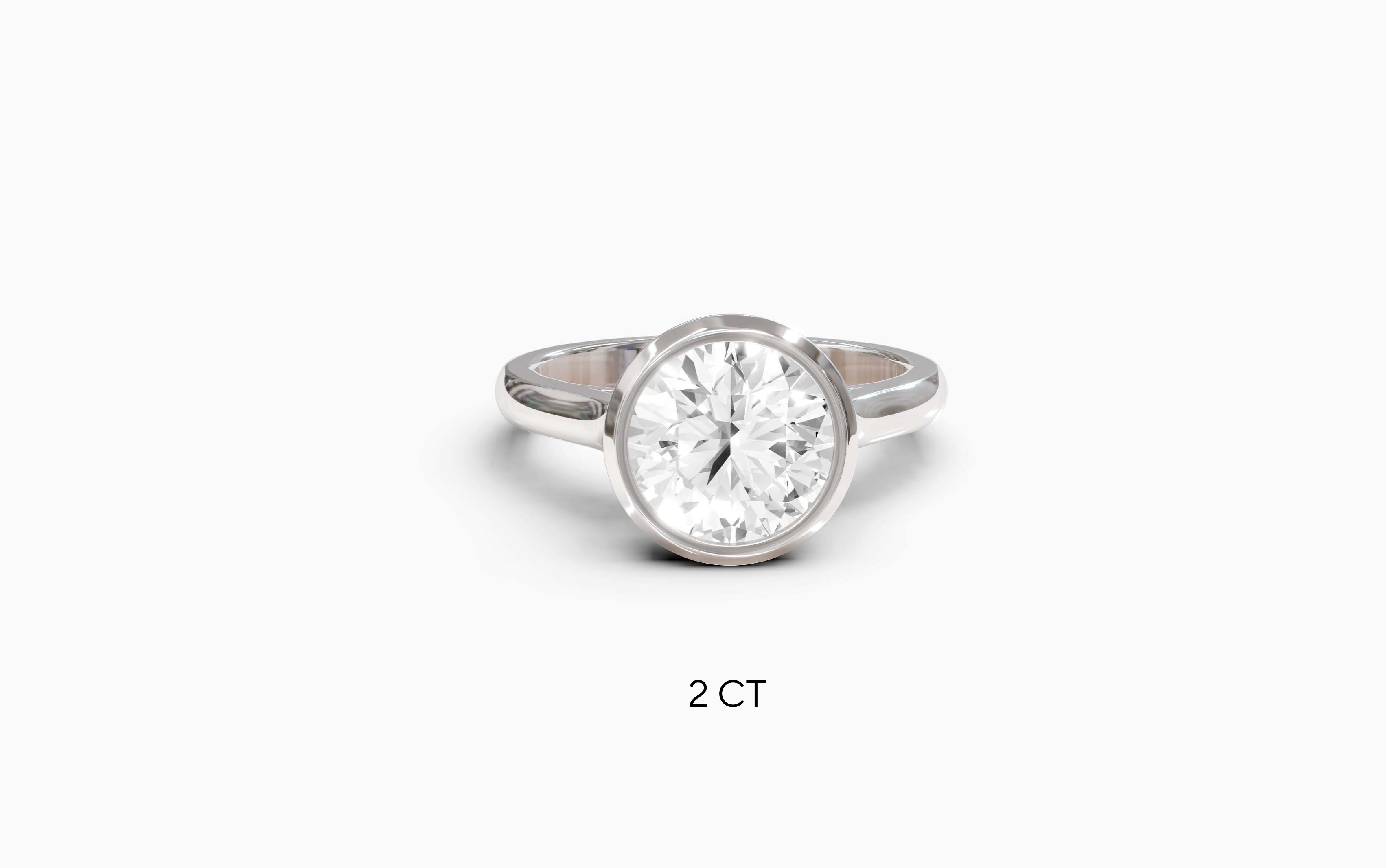 "Modern Perfection" Round Bezel Solitaire Ring in White Gold