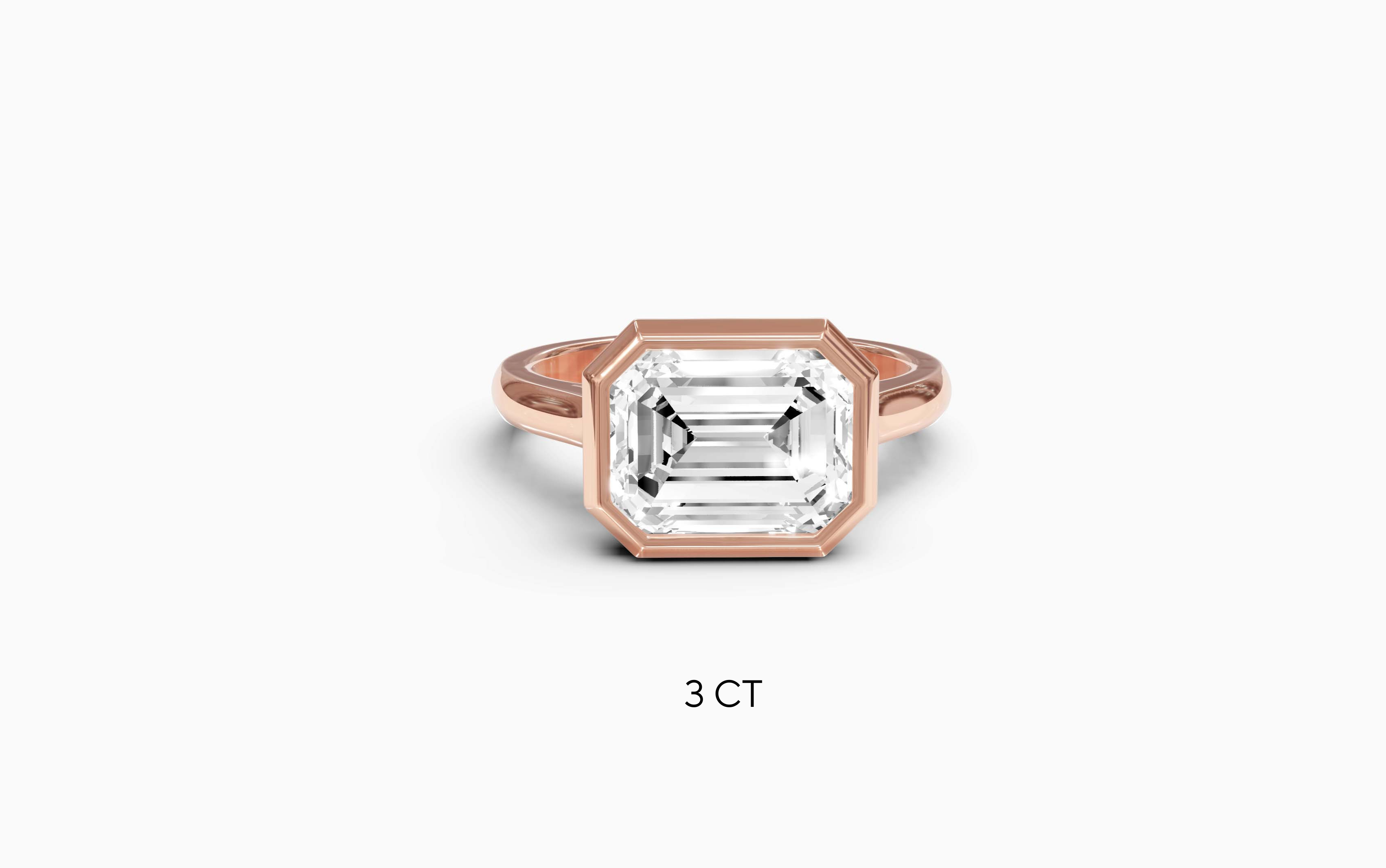 "It Girl" East-West Bezel Emerald Cut Solitaire Ring in Rose Gold