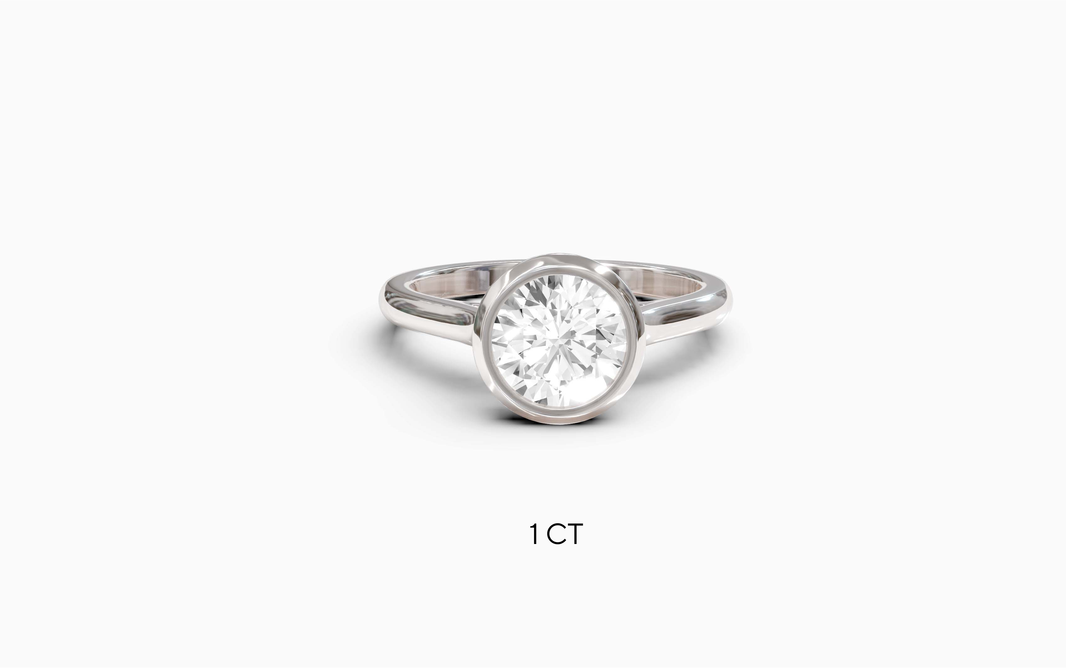 "Modern Perfection" Round Bezel Solitaire Ring in White Gold