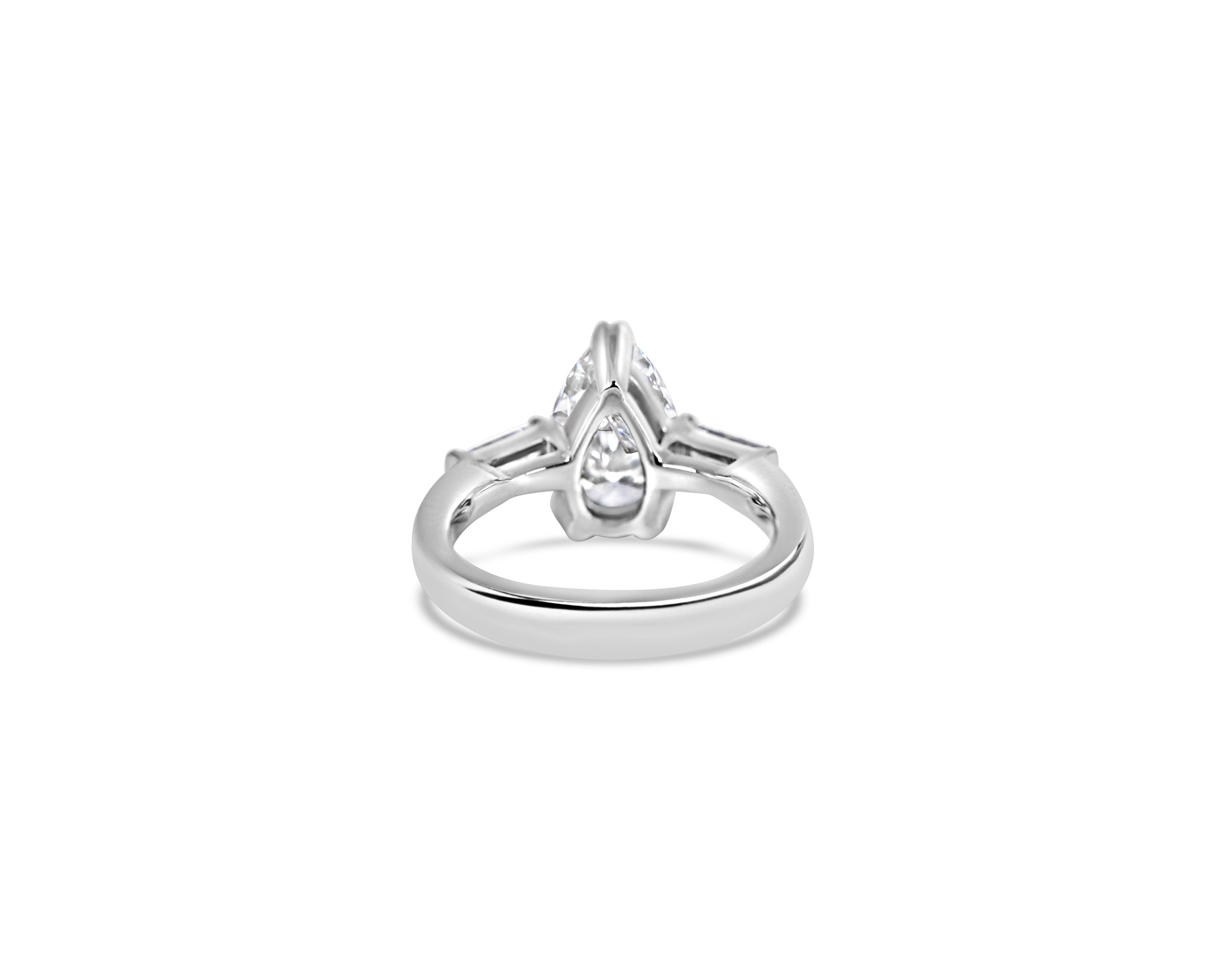 "Drop of Light" Pear and Tapered Baguette Three-Stone Ring