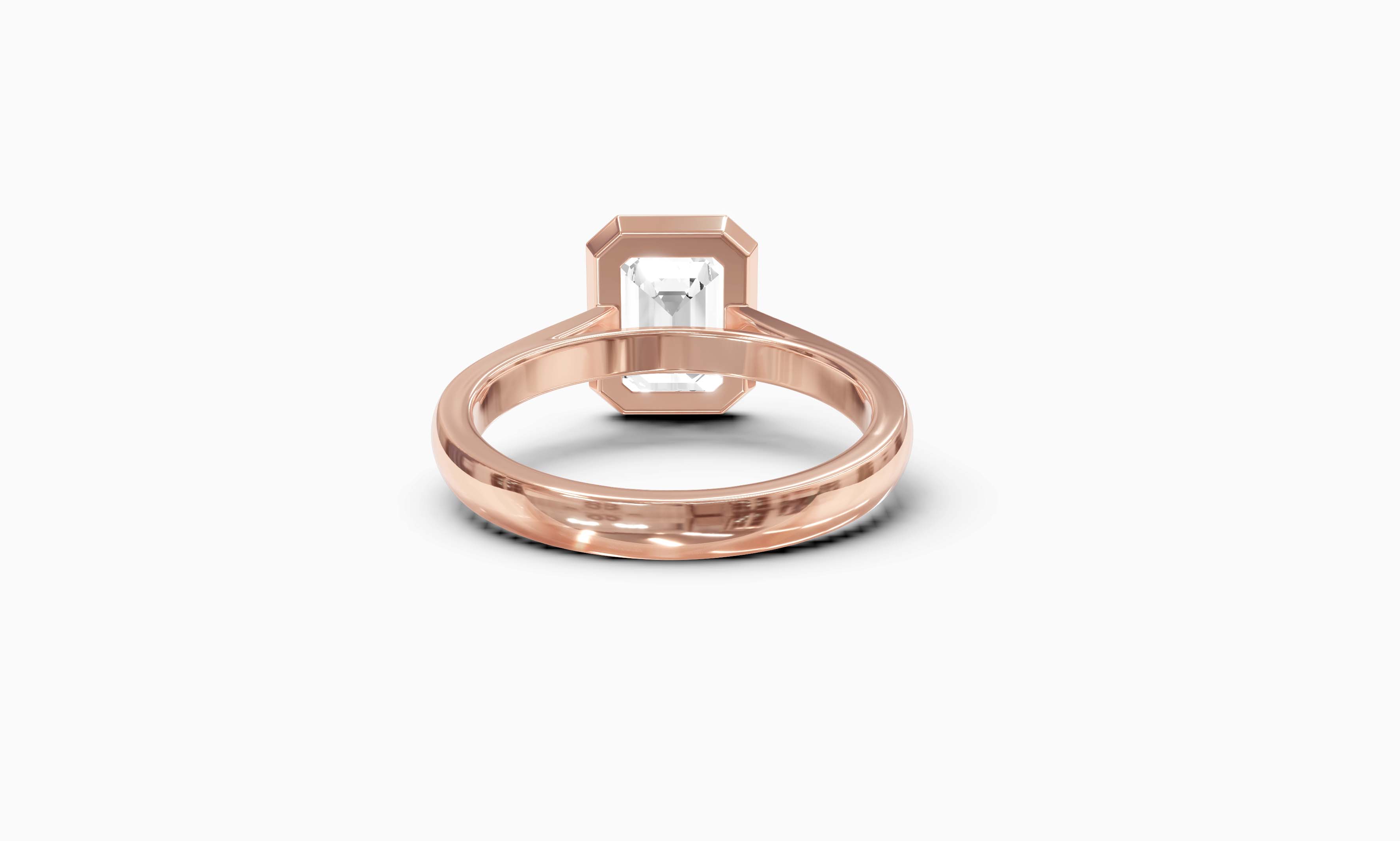 "It Girl" Bezel Emerald Cut Solitaire Ring in Rose Gold