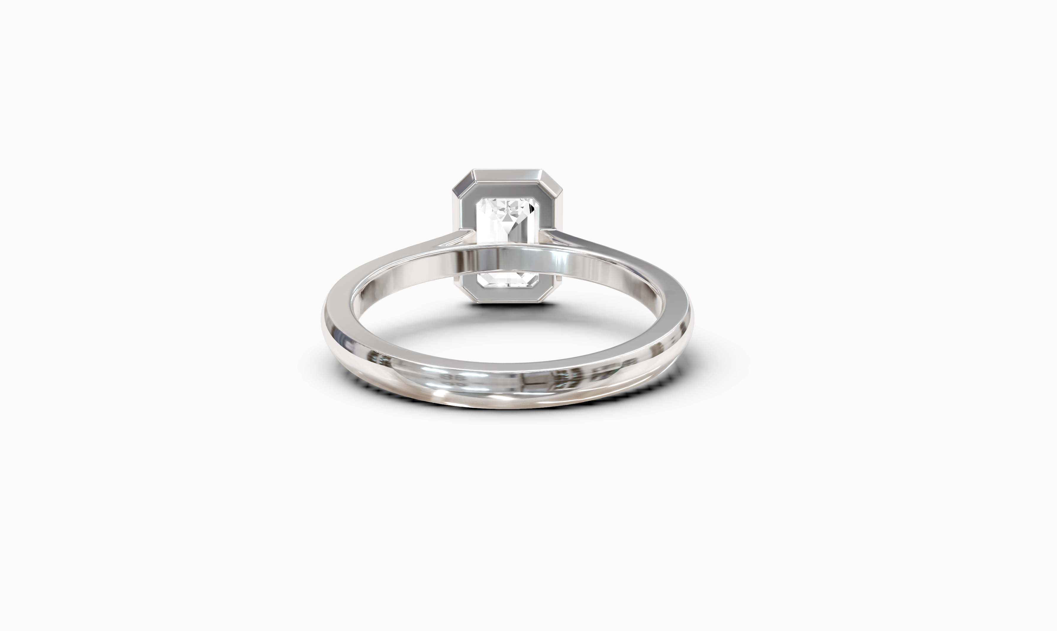 "It Girl" Bezel Emerald Cut Solitaire Ring in White Gold