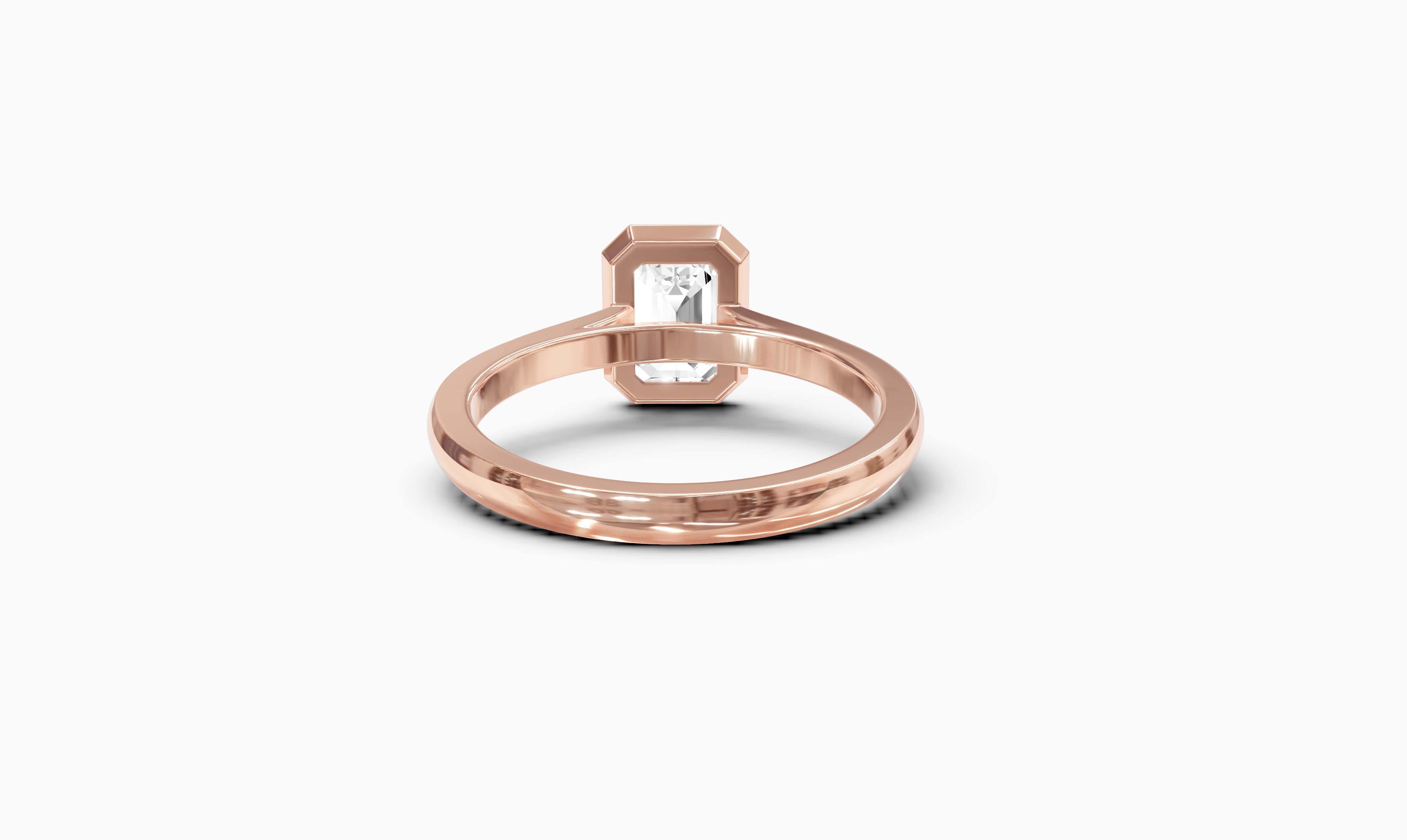 "It Girl" Bezel Emerald Cut Solitaire Ring in Rose Gold