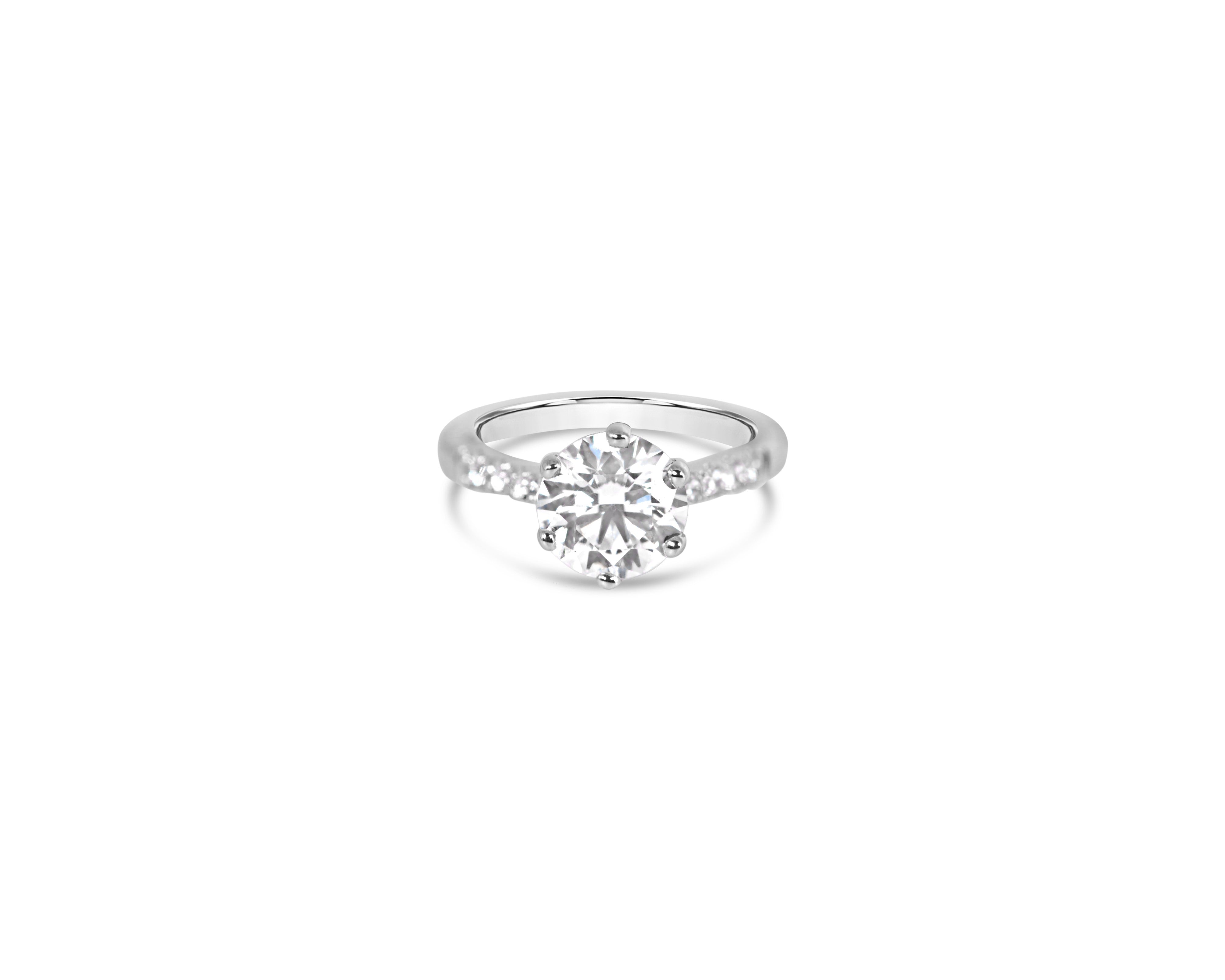 "Fit for a Queen, L"  Round Solitaire Ring on Crown Basket with Pavé Band