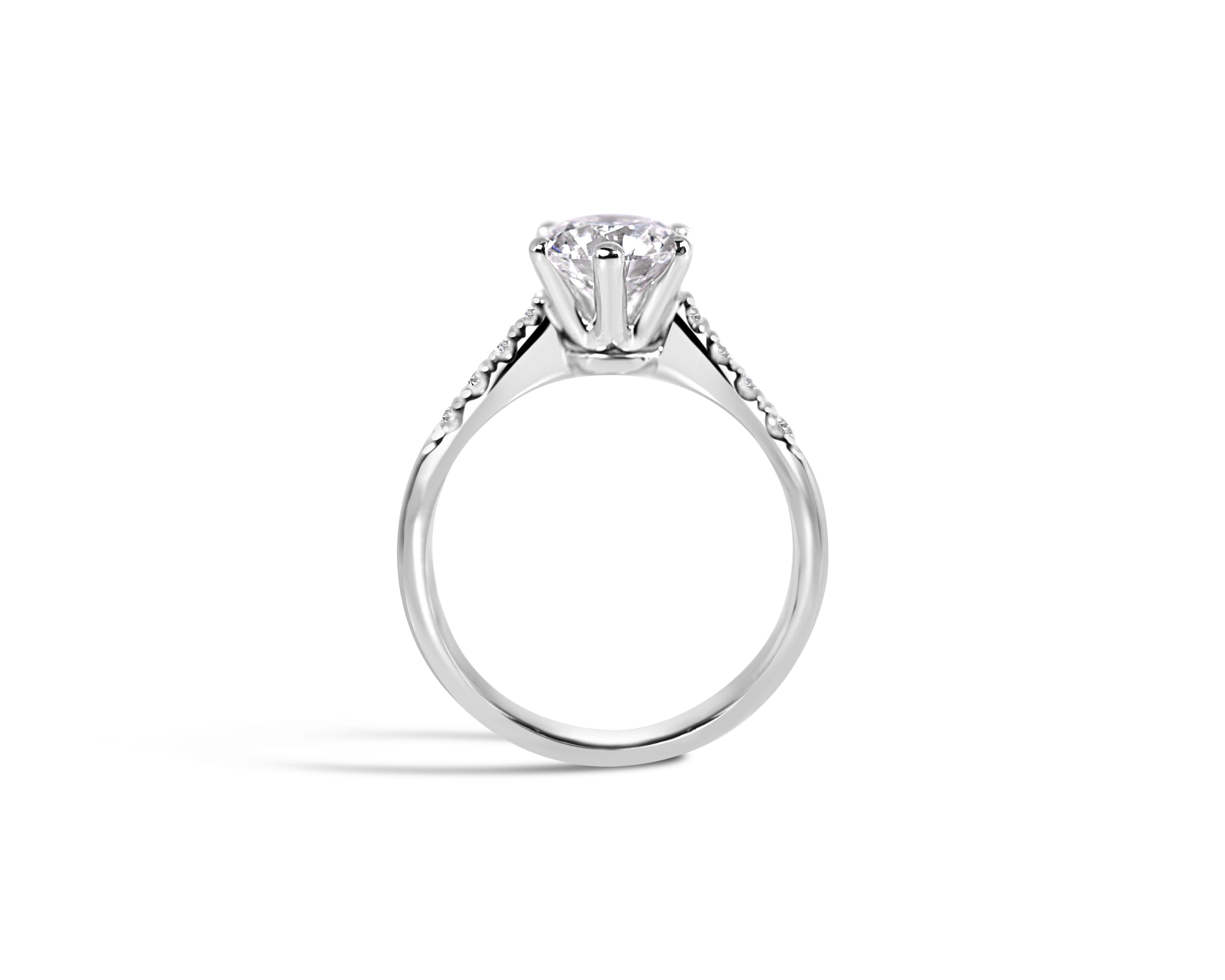 "Fit for a Queen, M" Round Solitaire Ring on Crown Basket with Pavé Band