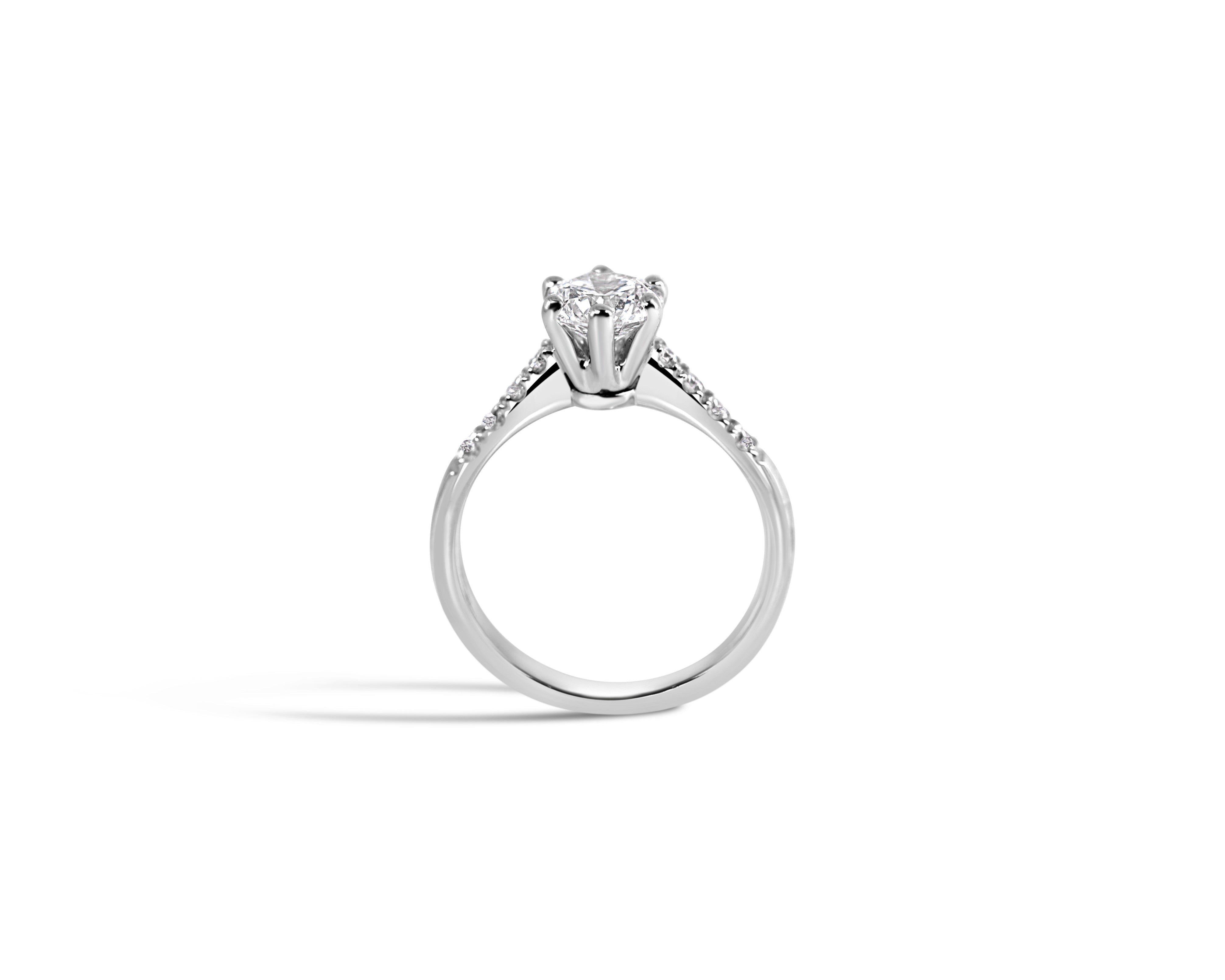 "Fit for a Queen, S" Round Solitaire Ring on Crown Basket with Pavé Band