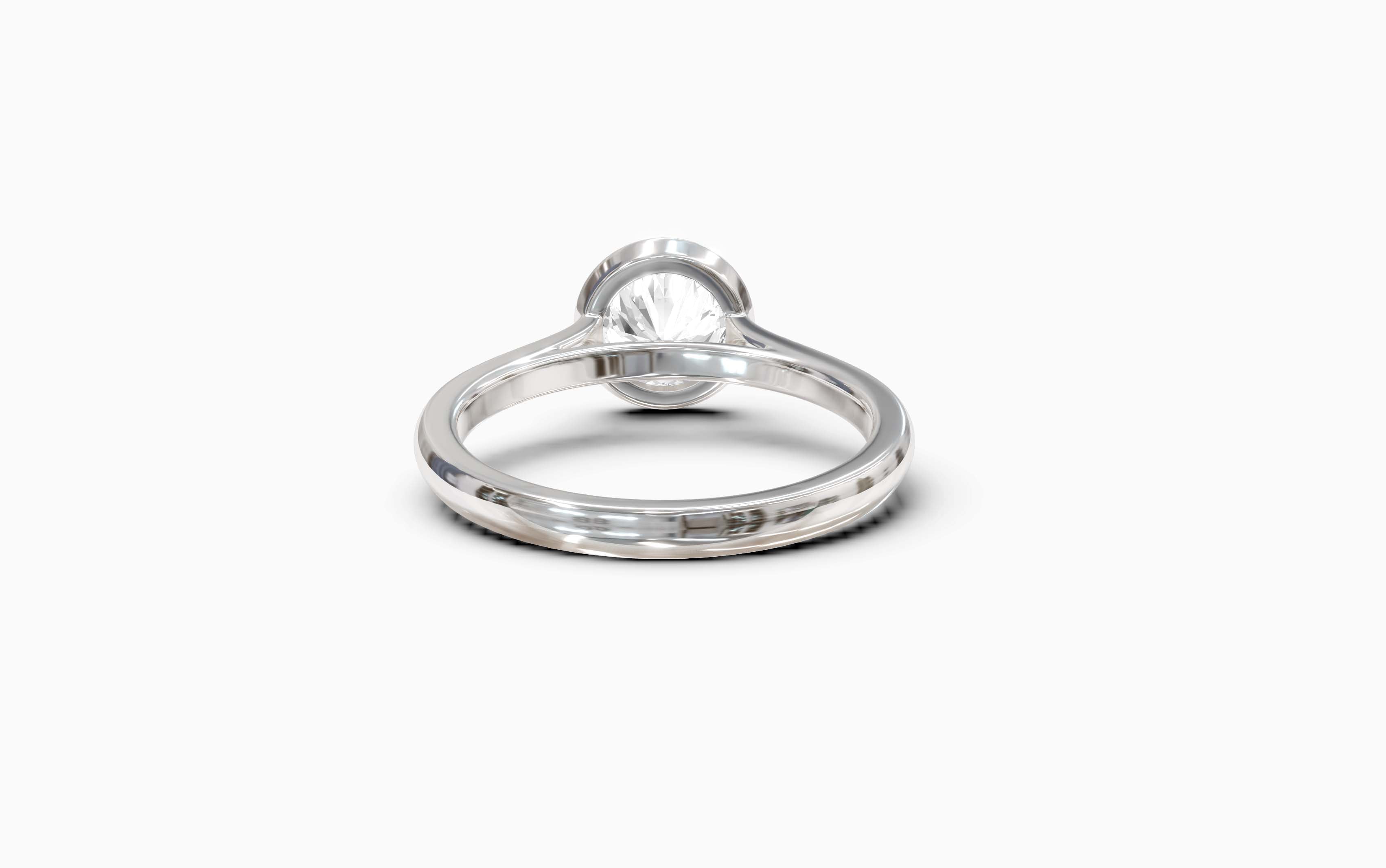 "Modern Perfection" Round Bezel Solitaire Ring in White Gold